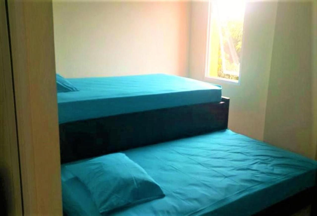 Giant Kost Hotel Tangerang Exterior photo